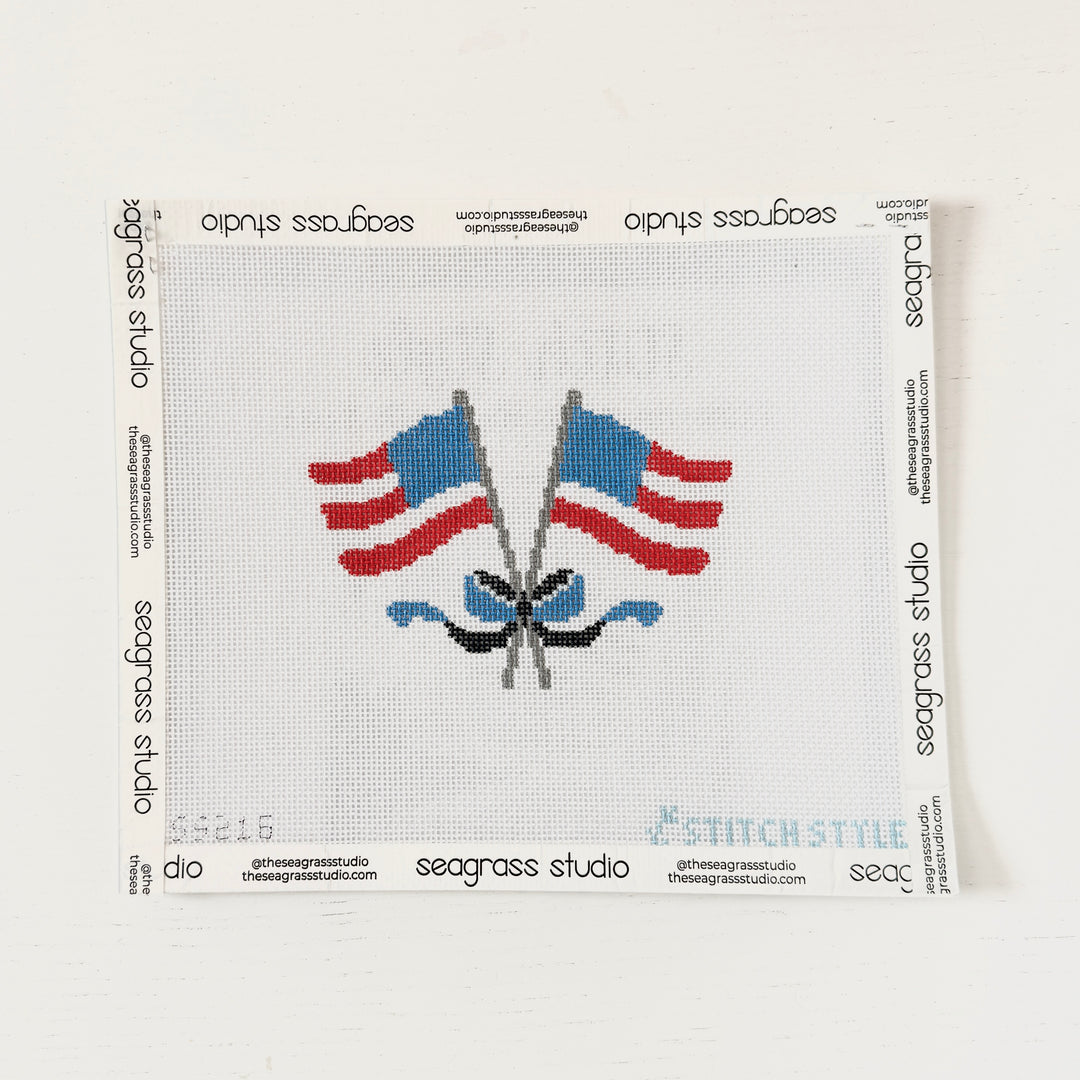 crossed flags with bow