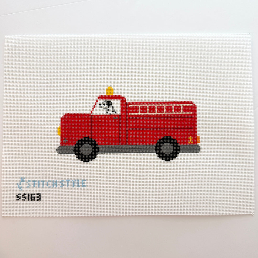 dalmatian in firetruck