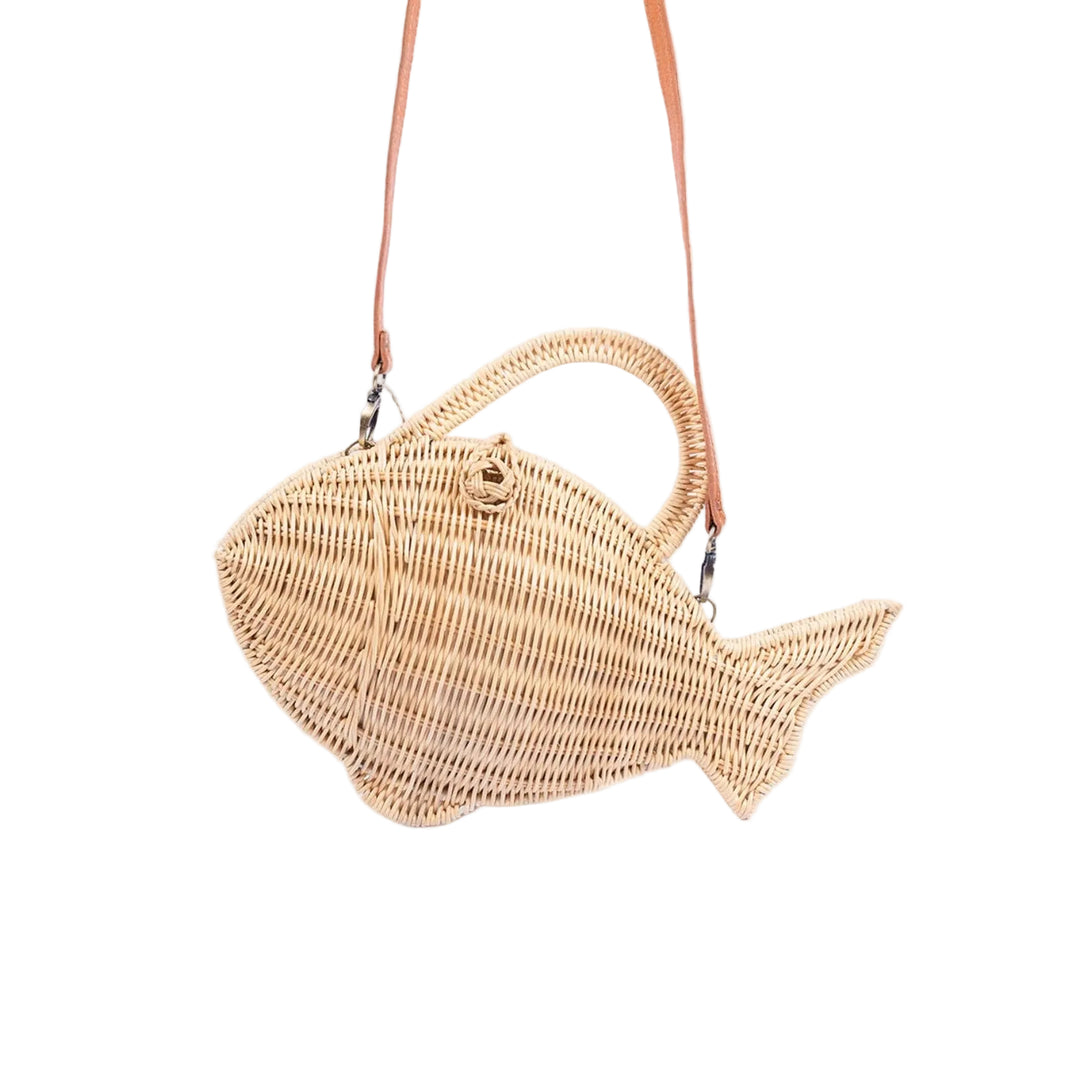 Woven fish-shaped handbag with a strap on a light gray background