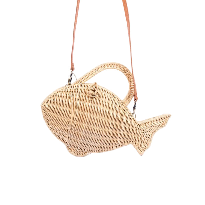 Woven fish-shaped handbag with a strap on a light gray background