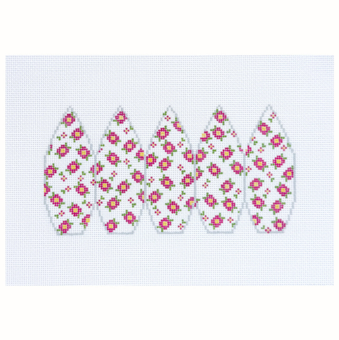 Floral patterned earrings on a white background
