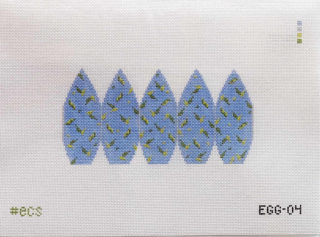 Pattern of blue leaves with yellow centers on a white background