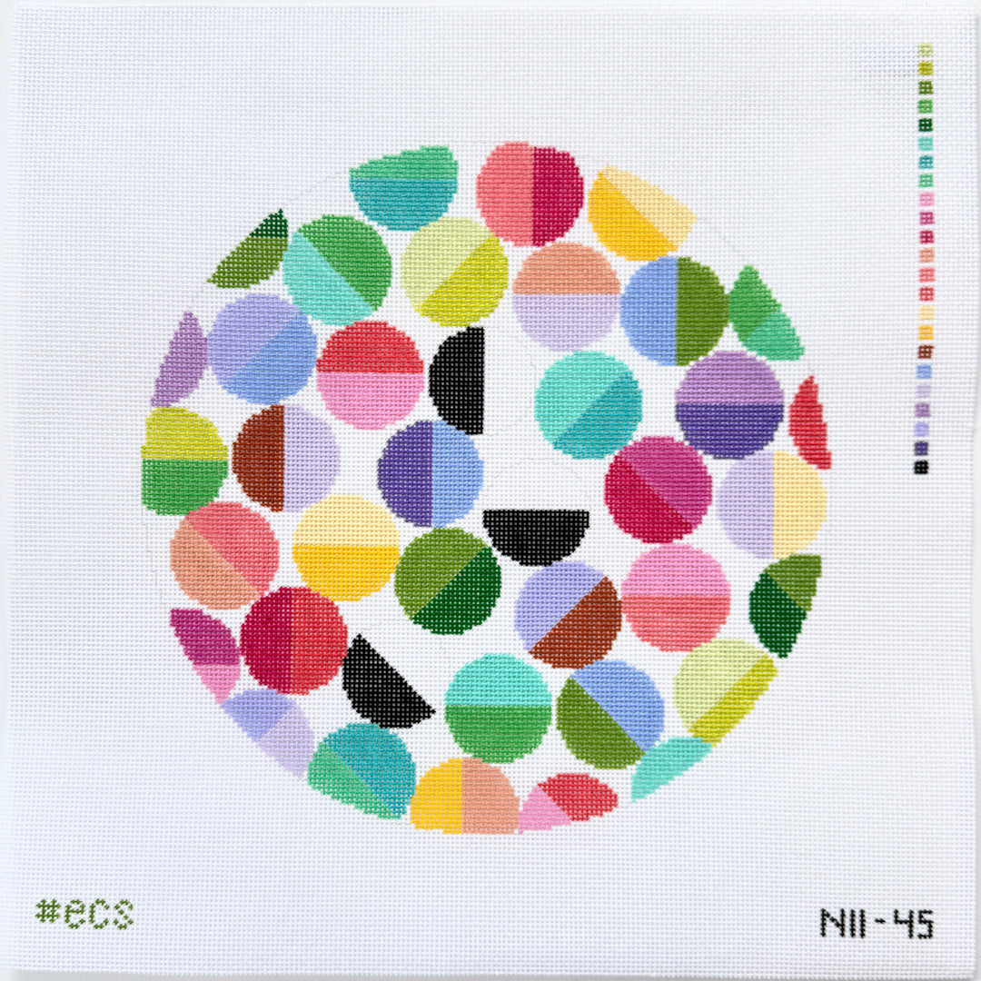 Colorful geometric needlepoint design on a white background 