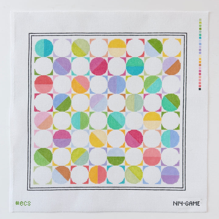 Colorful geometric needlepoint design on a white background 