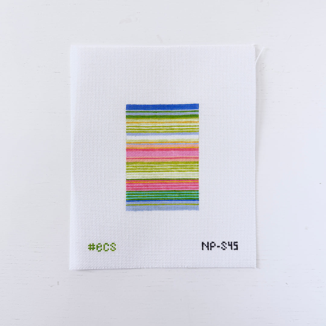 needlepoint design with colorful horizontal stripes on a white background