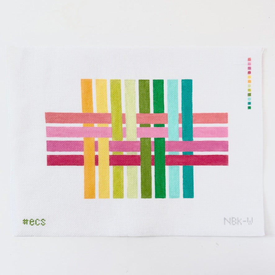 needlepoint design of colorful stripes on white mesh background