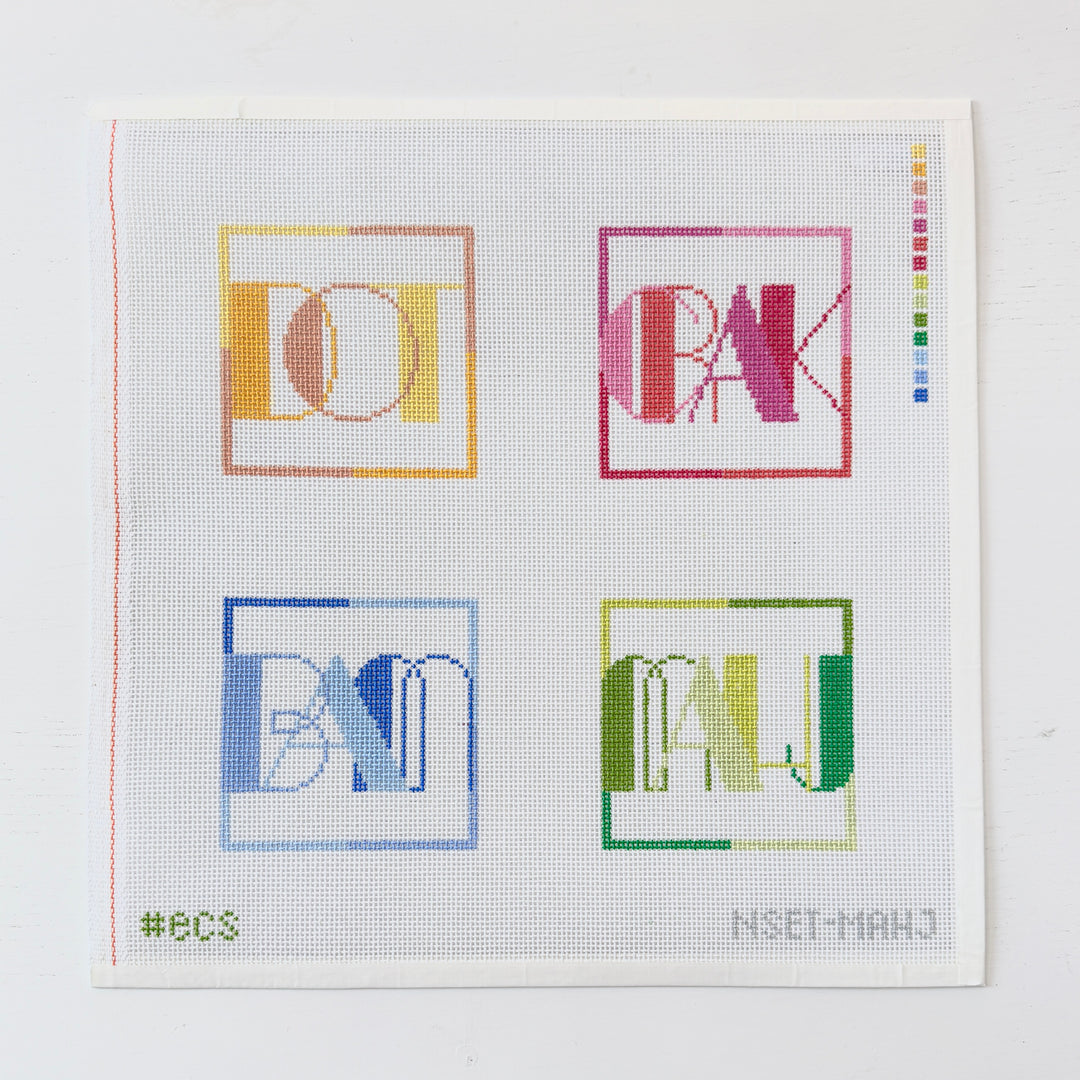 needlepoint design with colorful words on a white background